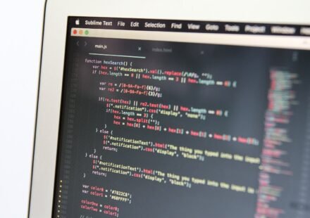Close-up of a laptop showing code in an editor