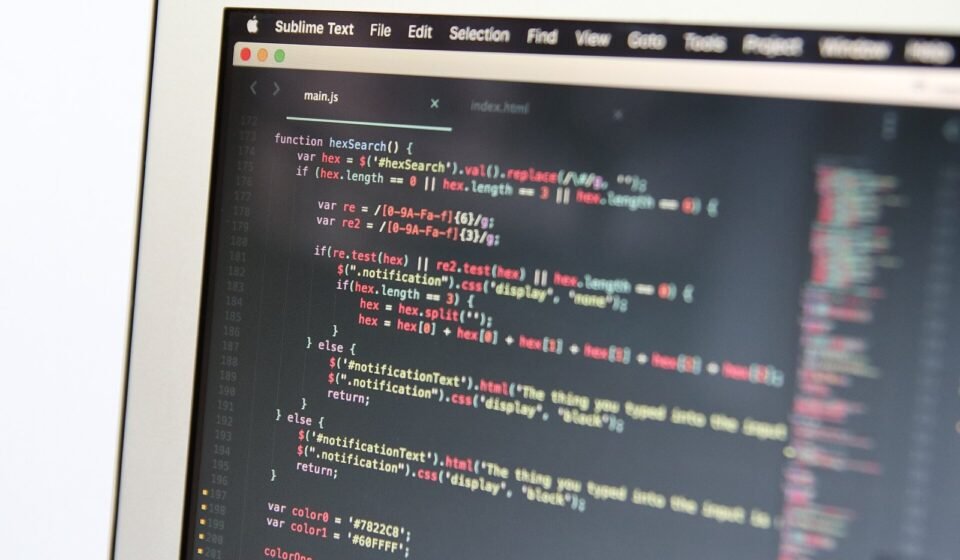 Close-up of a laptop showing code in an editor