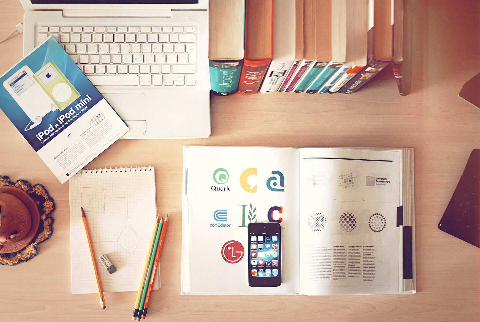 Books and laptop on a desk