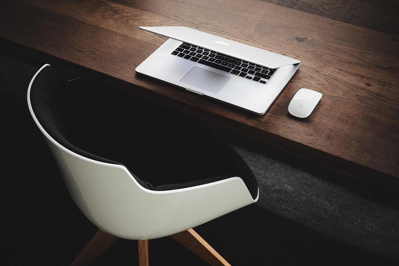 Desk with laptop and phone after work